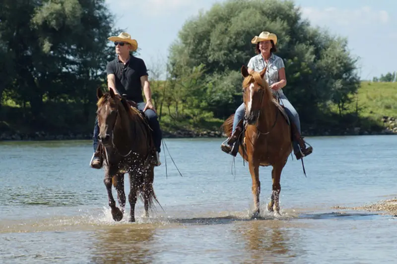 two riders in the Danube, Bavaria