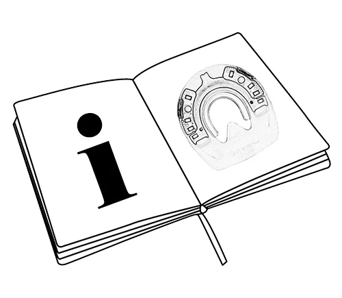 Ein offenes Buch mit einem Infozeichen und einem Duplo-Beschlag - ein Hinweis auf eine Bedienungsanleitung und Sicherheitsinformationen