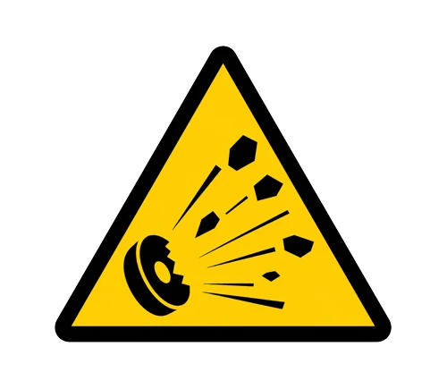 Warning symbol indicating a risk of injury from flying parts when working with the Shoe Spreader.