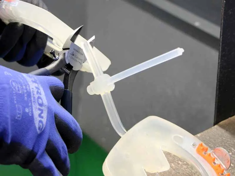 Cutting off the sprue of urethane horseshoes