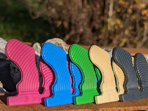 Linguette adesive Wolf Busch rosa, blu, verdi e color zoccolo chiare e scure.